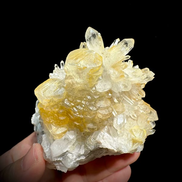 Golden-skinned calcite crystals with clear quartz spray from Fujian, China, reverse side