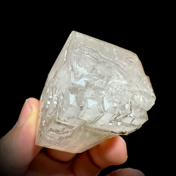 Large colourless calcite rhomb with pyrite from Fujian, China, top view