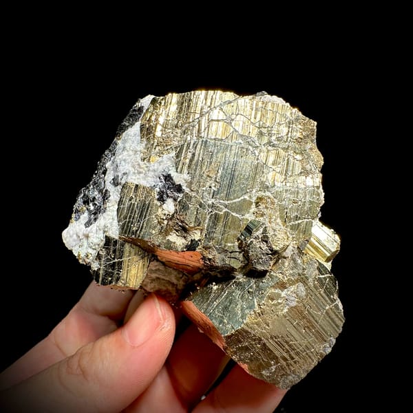 Heavy brass-gold pyrite block with striated faces and galena from Hunan, China, second angle