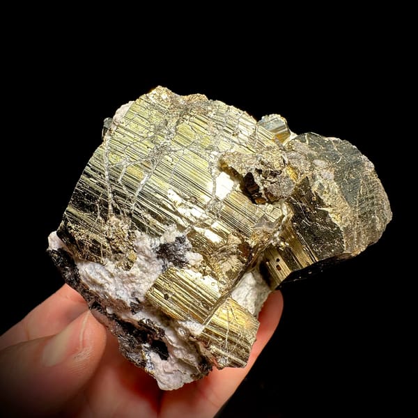 Heavy brass-gold pyrite block with striated faces and galena from Hunan, China, reverse side