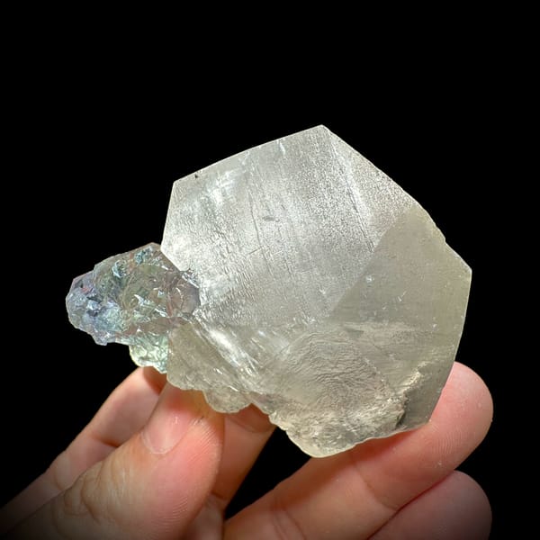 Large translucent star calcite with glassy blue-green fluorite from Fujian, China, reverse side