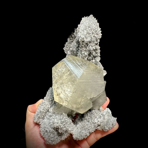 Giant star calcite crystal on long quartz-needle plate from Fujian, China, close-up of the crystal faces
