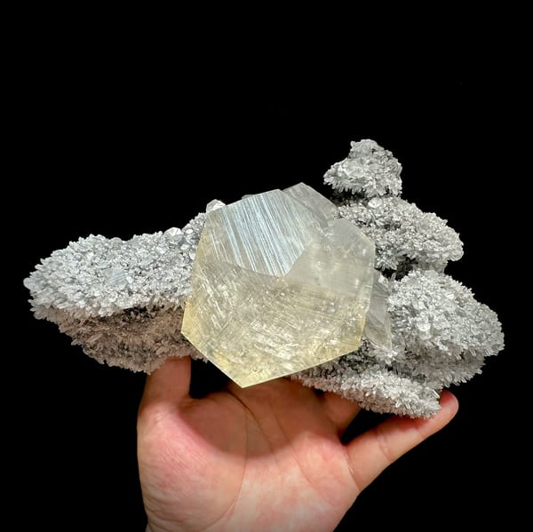 Giant star calcite crystal on long quartz-needle plate from Fujian, China, top view