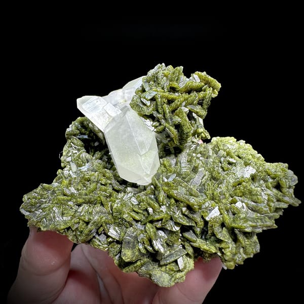 Clear double-terminated quartz nested in green epidote from Sichuan, China, detail of the matrix contact