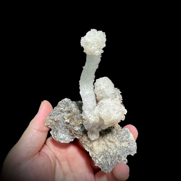 Curved white gypsum spire from Guizhou, China, reverse side