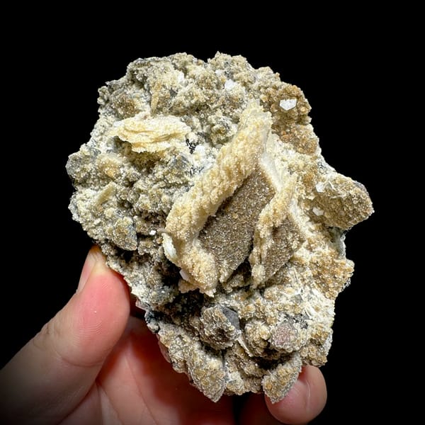 Tan calcite blades with zeolite and quartz on feldspar from Yunxiao, Fujian, China, top view
