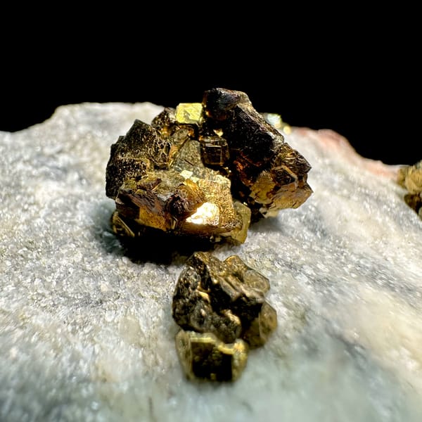 Brassy pyrite crystal clusters on pale sugary plate from Fujian, China, second angle