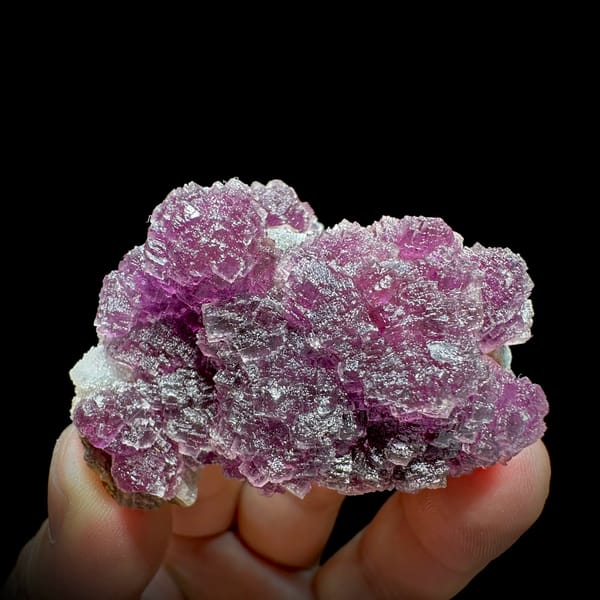 Raspberry-purple stepped fluorite crystals from Zhejiang, China, top view