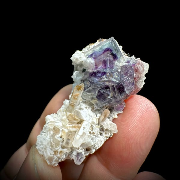 Phantom-zoned blue-purple fluorite cube on quartz from Inner Mongolia, China, second angle