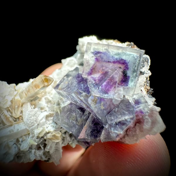 Phantom-zoned blue-purple fluorite cube on quartz from Inner Mongolia, China, reverse side