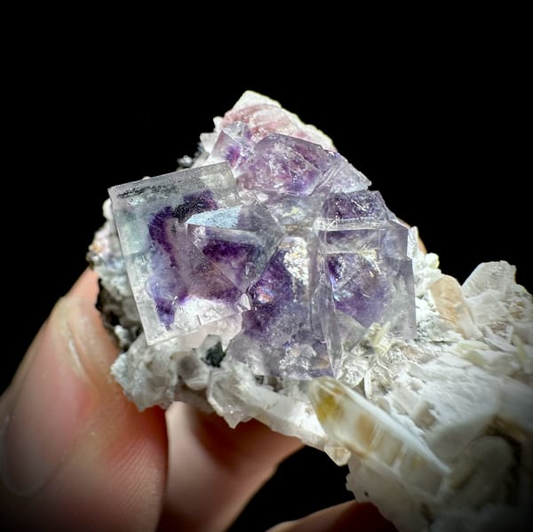 Phantom-zoned blue-purple fluorite cube on quartz from Inner Mongolia, China, top view