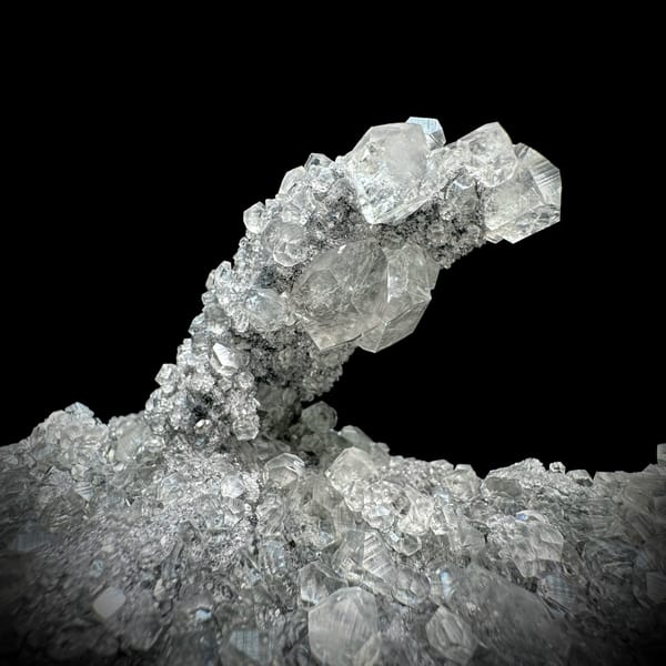 Branching frosted transparent calcite cluster from Fujian, China, reverse side