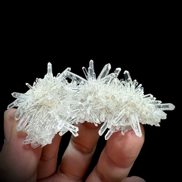 Transparent chrysanthemum quartz spray from Jinkouhe, Sichuan, China, close-up of the crystal faces