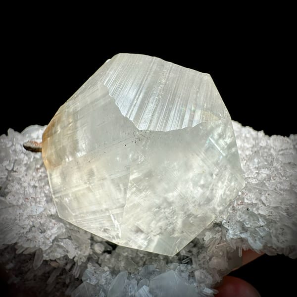 Large star calcite crystal on quartz needles with pyrite from Fujian, China, top view