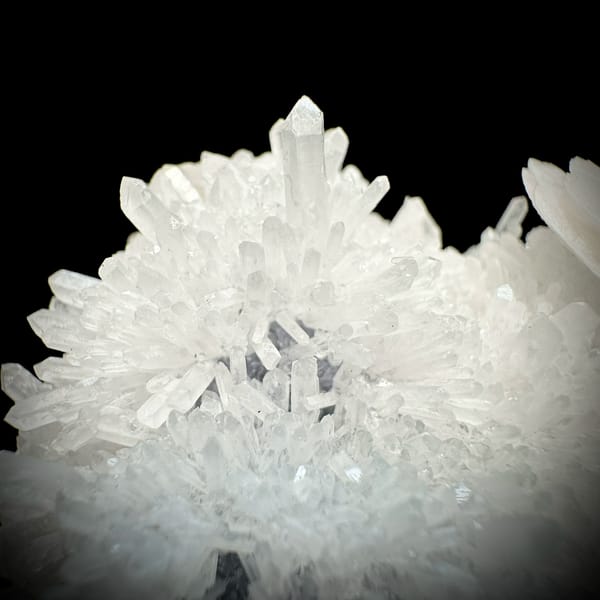 White quartz-needle cluster with platy calcite crystal from Fujian, China, top view