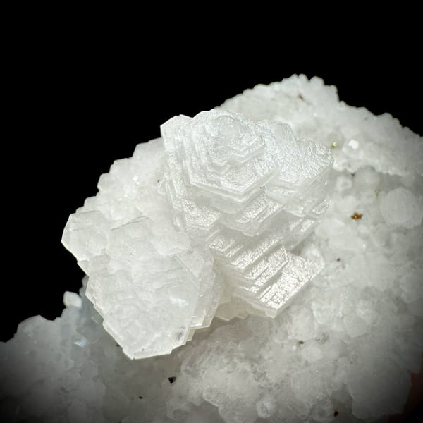 Stacked pagoda calcite tower on white quartz from Guangdong, China, reverse side