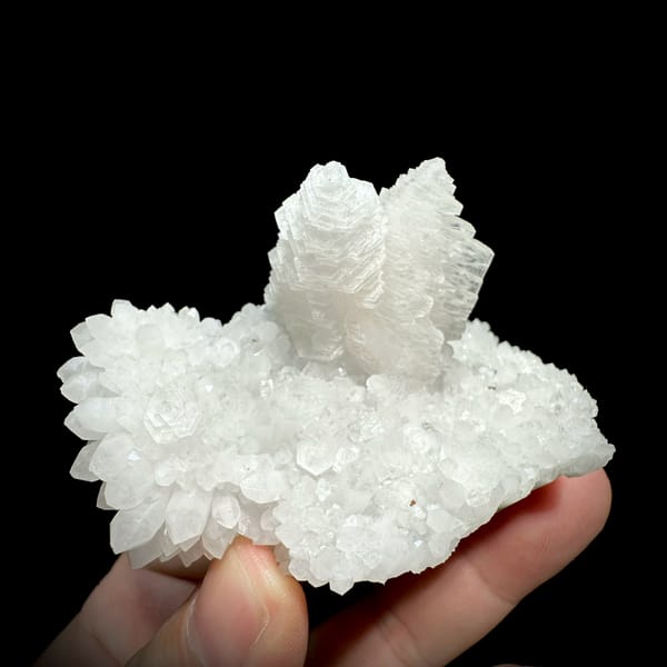 Stacked pagoda calcite tower on white quartz from Guangdong, China, top view