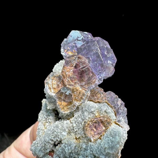 Lavender fluorite cubes on tall grey quartz stalk from Fujian, China, second angle