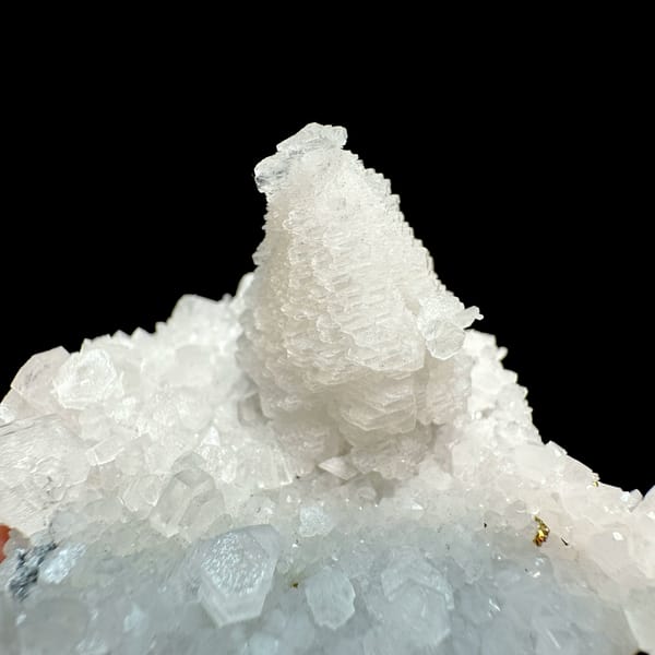 White pagoda calcite tower on quartz druse from Guangdong, China, top view
