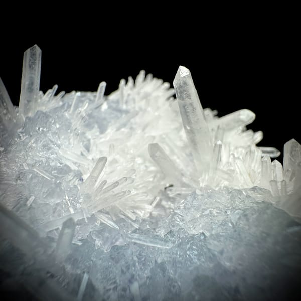 Clear quartz needles over pale blue fluorite from Fujian, China, second angle