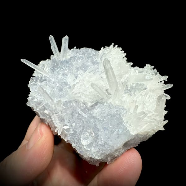 Clear quartz needles over pale blue fluorite from Fujian, China, reverse side