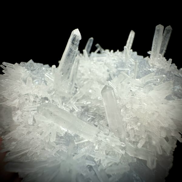 Clear quartz needles over pale blue fluorite from Fujian, China, top view