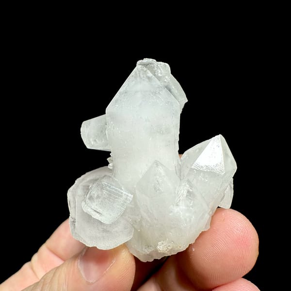 Stacked translucent calcite rhombs with pyrite from Fujian, China, close-up of the crystal faces