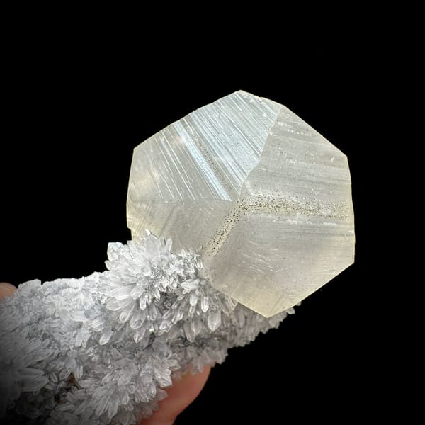 Large star calcite crystal on long quartz-needle branch from Fujian, China, reverse side