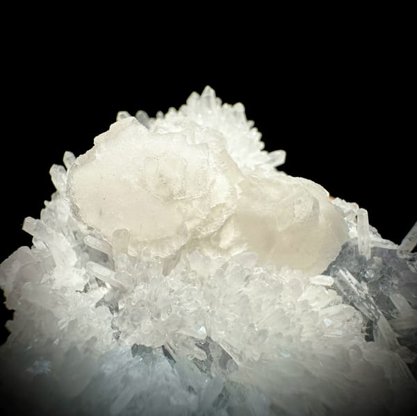 White quartz needles with calcite discs and pale blue fluorite from Fujian, China, reverse side