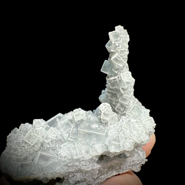 Sketch-patterned fluorite pillar of stacked cubes from Fujian, China, second angle