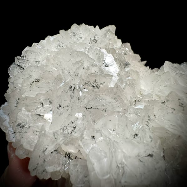Rounded plate of flower-form calcite with limonite from Fujian, China, top view