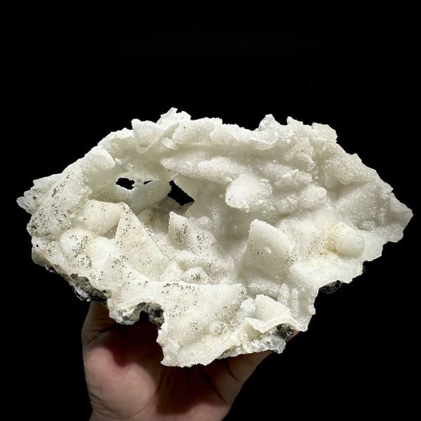 Cream quartz pseudomorphs after calcite with pyrite from Fujian, China, detail of the matrix contact
