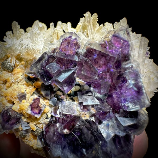 Purple phantom fluorite cubes in white quartz with siderite from Inner Mongolia, China, second angle