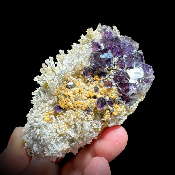 Purple phantom fluorite cubes in white quartz with siderite from Inner Mongolia, China, reverse side