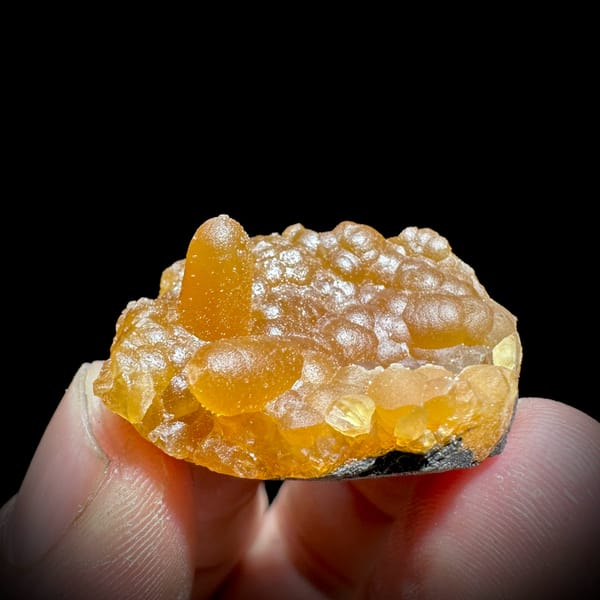 Tiny orange caterpillar-form calcite from Yunxiao, Fujian, China, second angle