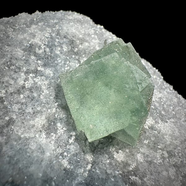 Mint-green fluorite cube on sparkling pyrite-dusted quartz from Fujian, China, second angle