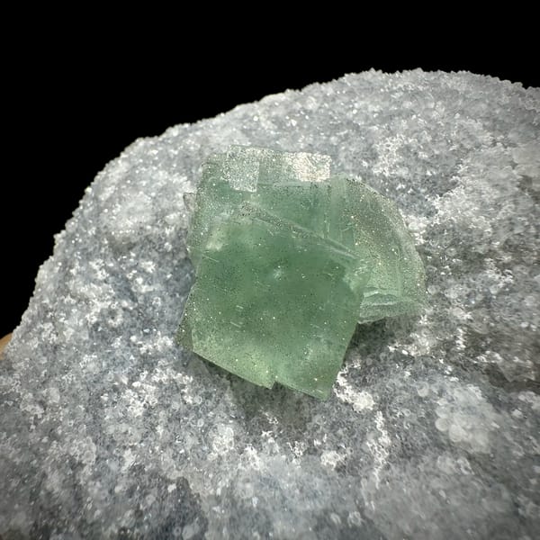 Mint-green fluorite cube on sparkling pyrite-dusted quartz from Fujian, China, reverse side