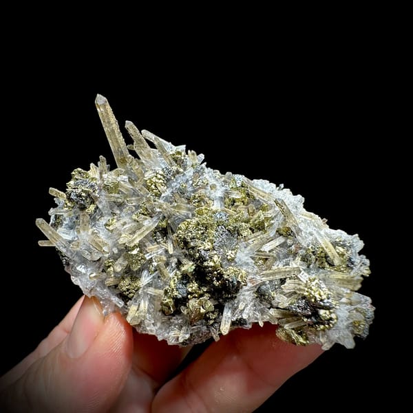 Clear quartz needles over chalcopyrite and freibergite from Inner Mongolia, China, top view