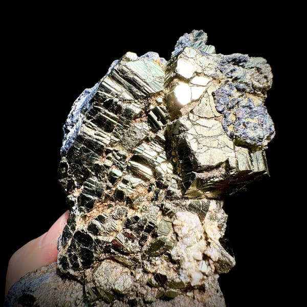 Gourd-shaped block of striated pyrite with galena from Hunan, China, second angle