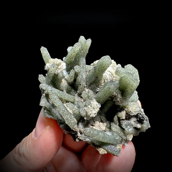 Green chlorite quartz prisms with white calcite from Inner Mongolia, China, detail of the matrix contact