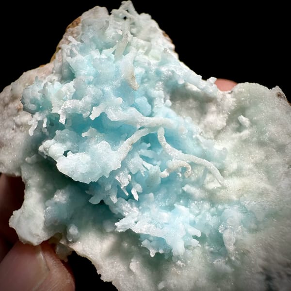 Sky-blue stalactitic aragonite in white aragonite frame from Yunnan, China, top view