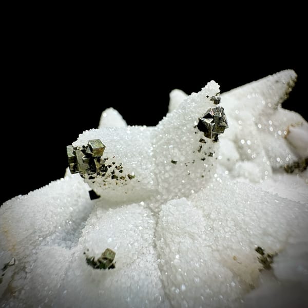 Plate of frosted white calcite crystals with pyrite from Fujian, China, second angle