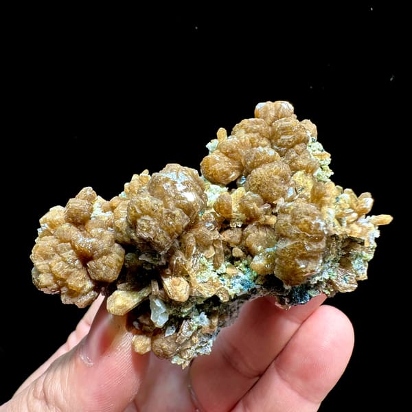 Golden-brown stilbite bow-ties with black specular hematite from Yunxiao, Fujian, China, second angle