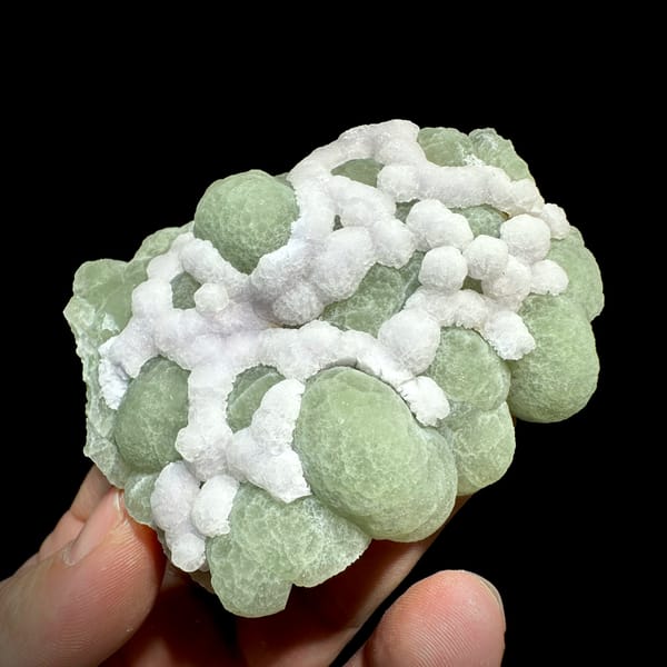 Mint-green fluorite balls laced with white fluorite from Henan, China, reverse side