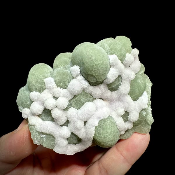 Mint-green fluorite balls laced with white fluorite from Henan, China, top view