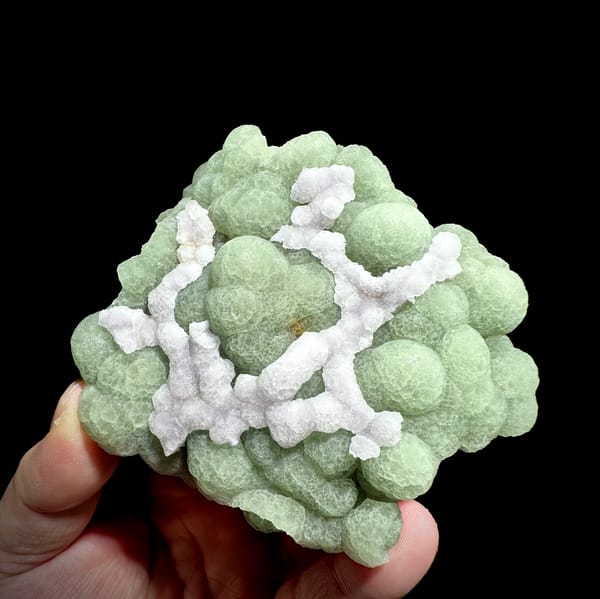 Pale green fluorite balls under lattice of white fluorite from Henan, China, second angle