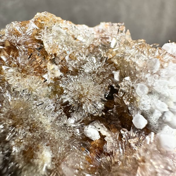 Creedite flowers over pale purple yttrofluorite from Guizhou, China, reverse side