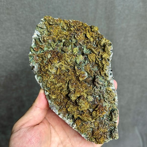 Iridescent pyrite crust covering calcite plate from Fujian, China, second angle