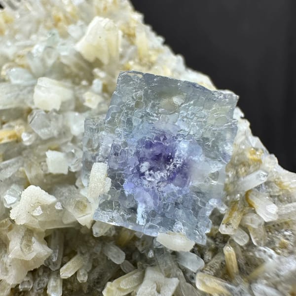 Pale blue fluorite cube on cream dolomite and quartz from Inner Mongolia, China, reverse side