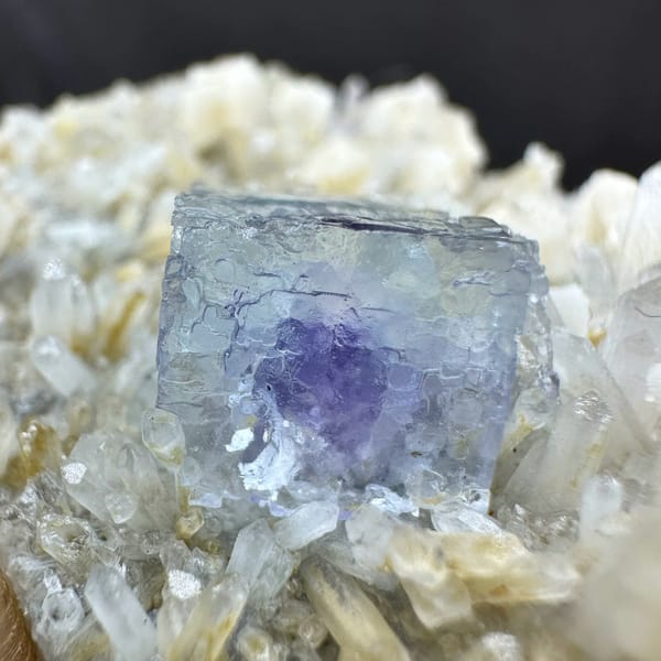 Pale blue fluorite cube on cream dolomite and quartz from Inner Mongolia, China, top view